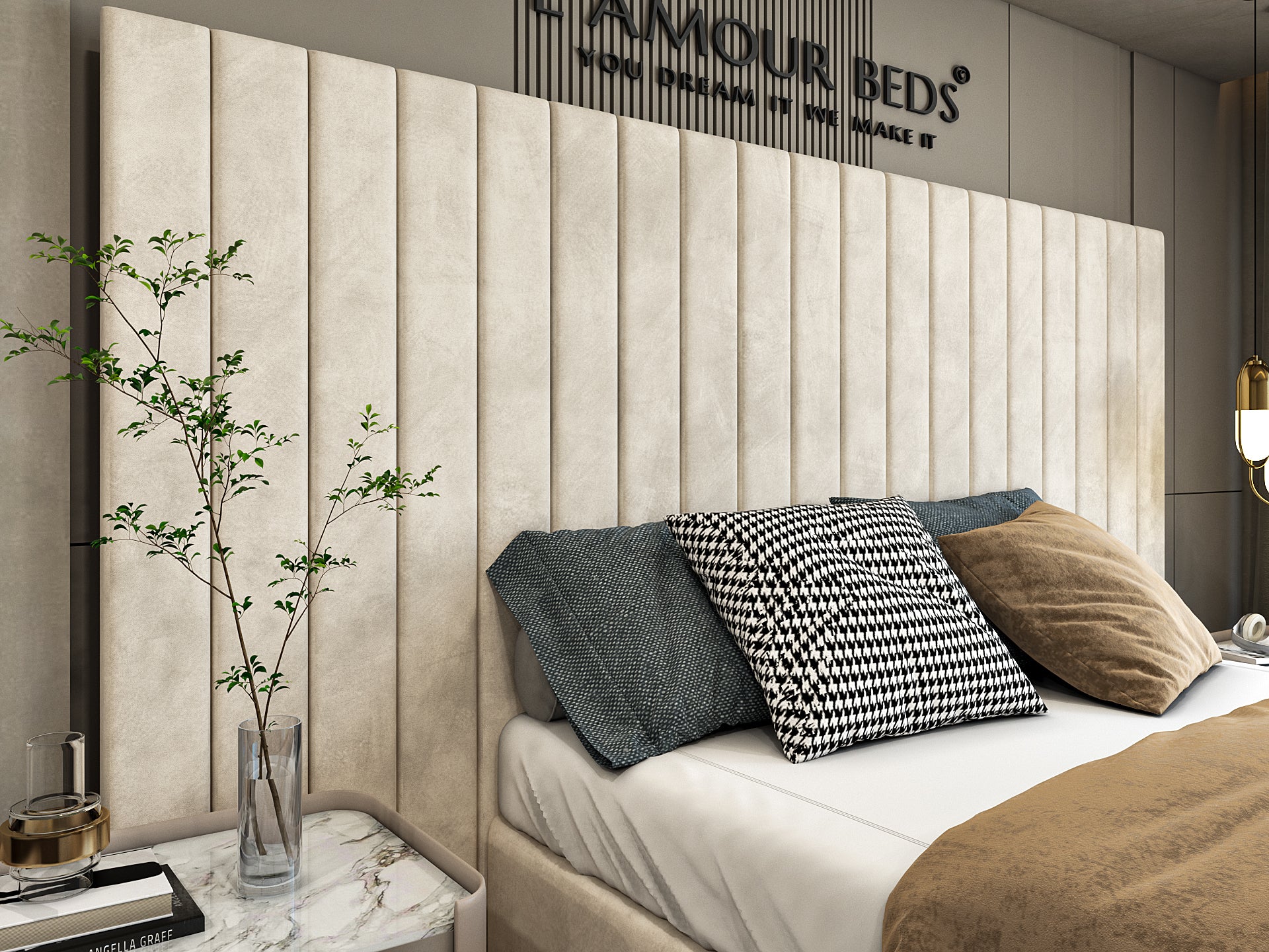 Modern bedroom with a neutral-toned padded headboard, gray and beige pillows, a cozy bedspread, a bedside table, and a decorative plant; serene ambiance.